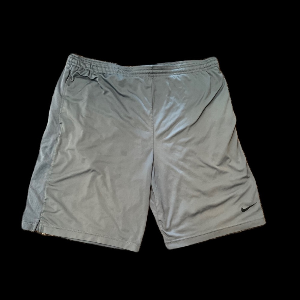 MEN'S ATHLETIC SHORTS: Nike Swoosh trademark on the men's shorts' left hem.